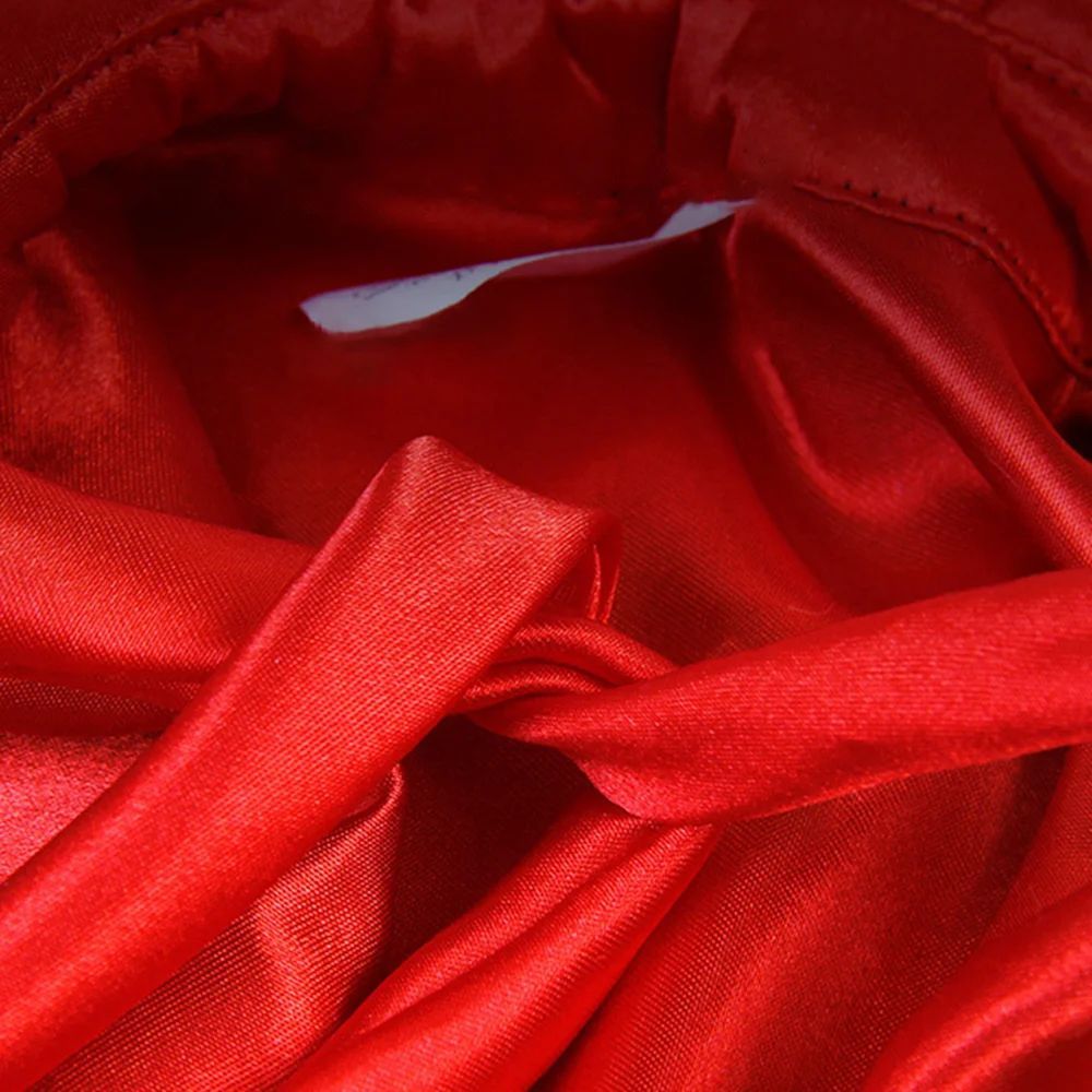 Close-up of red fabric with a visible brand label.
