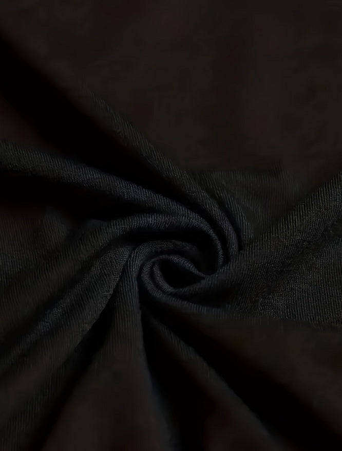 Close-up of dark fabric with folds