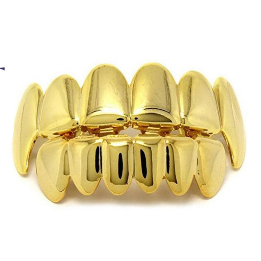 Gold grillz on a white background