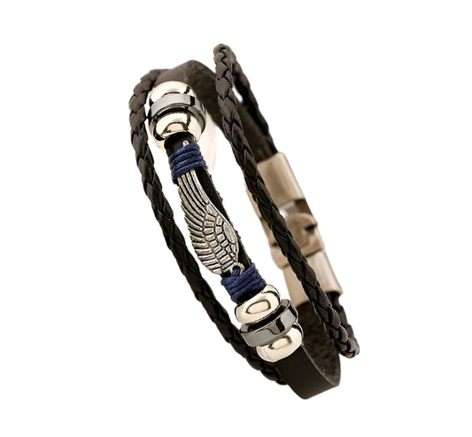 Black braided leather bracelet with silver and blue accents on a white surface.