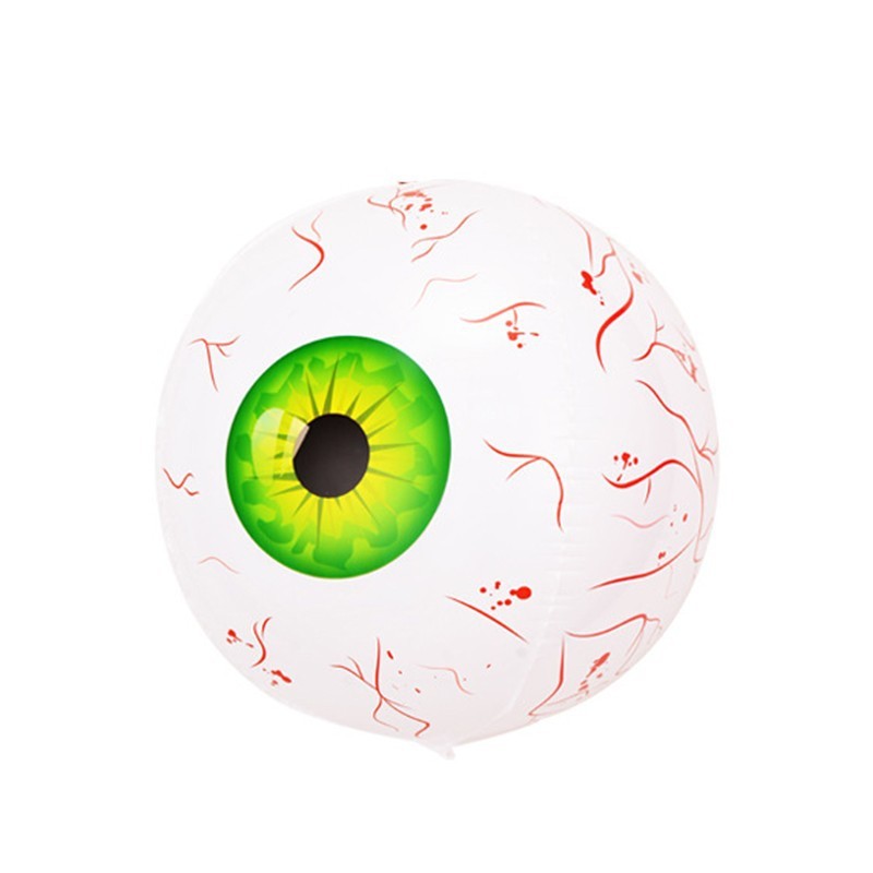 Toy eyeball with green iris and white sclera on a white background